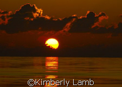 Gorgeous sunset off Little Cayman! by Kimberly Lamb 